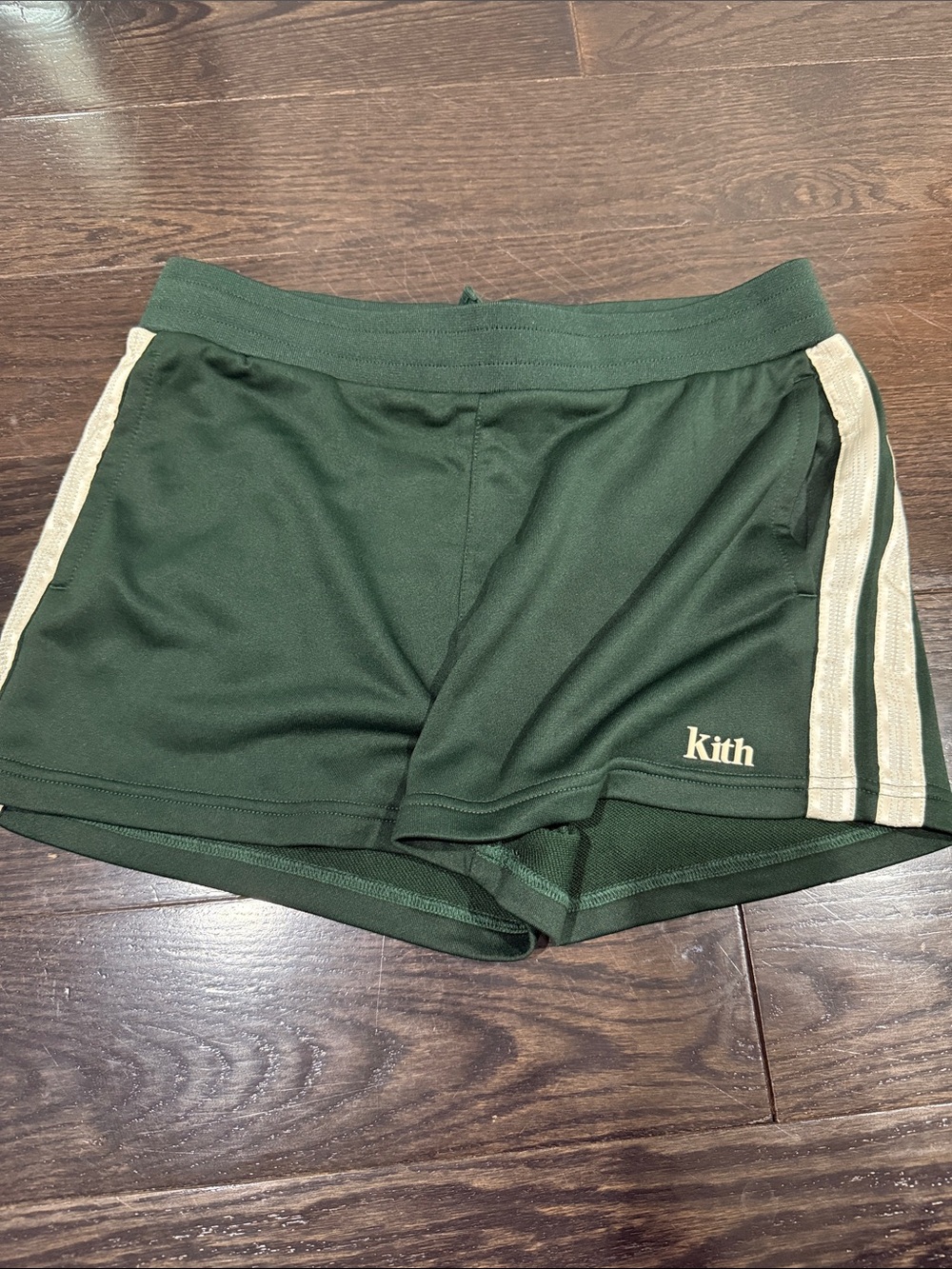 Kith Dark Green Athletic Shorts with Cream Side Stripes